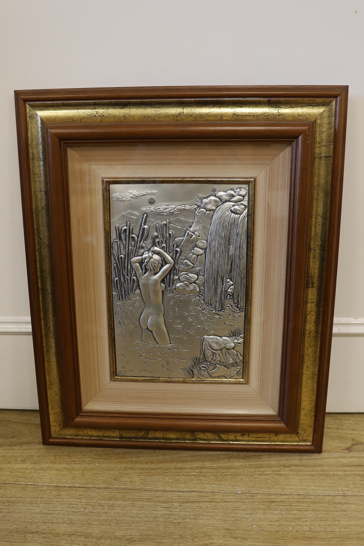 An Italian 925 framed silver plaque depicting a bathing nude lady, signed bottom left, certificate of authenticity to reverse, 27 x 18cm excl. frame. Condition - good